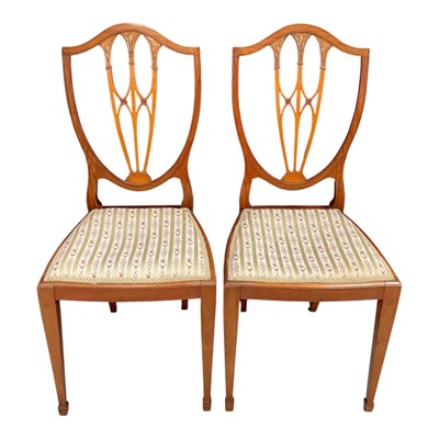 Lot 1391 - Pair Edwardian solid satinwood drawing room chairs with shield backs, standing on square tapering legs