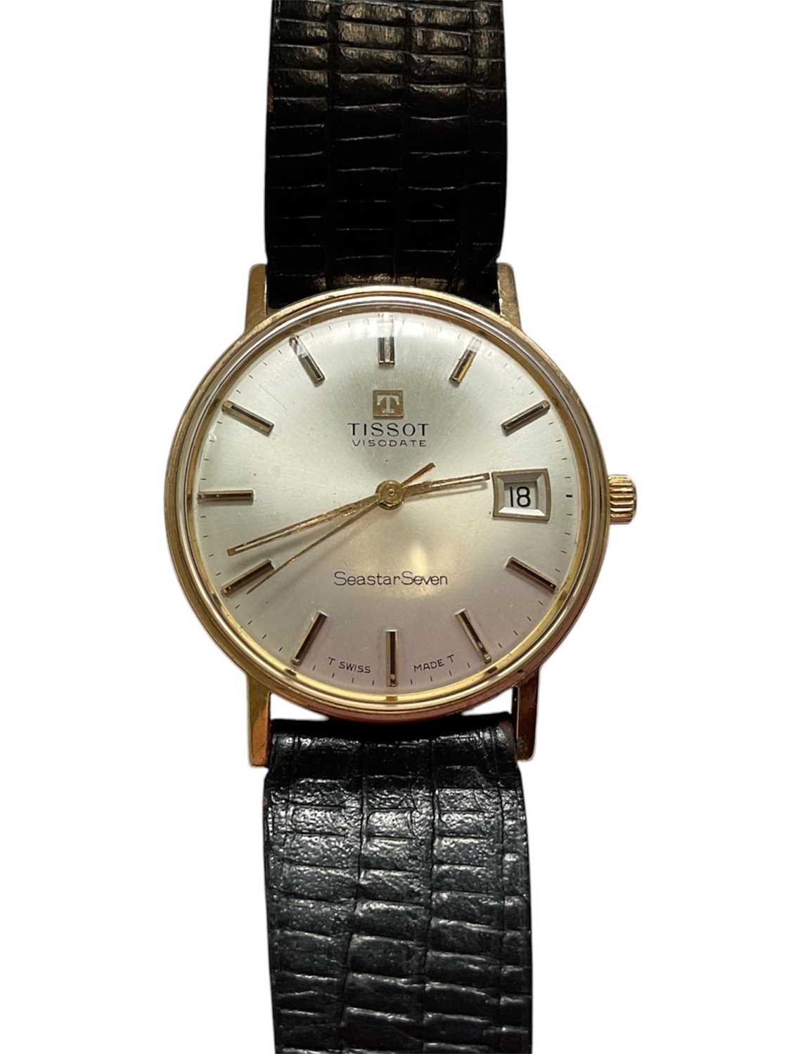 Lot 73 - Tissot Visodate Seastar Seven gold cased wristwatch on black leather strap. Case diameter 33mm