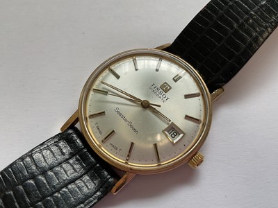Lot 73 - Tissot Visodate Seastar Seven gold cased wristwatch on black leather strap. Case diameter 33mm