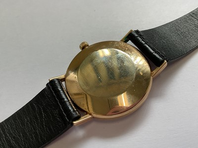 Lot 73 - Tissot Visodate Seastar Seven gold cased wristwatch on black leather strap. Case diameter 33mm