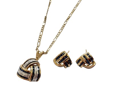 Lot 79 - 9ct gold sapphire and diamond three panel cross-over pendant on 9ct gold flat curb link chain, together with a pair of similar design 9ct gold sapphire stud earrings