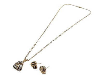 Lot 79 - 9ct gold sapphire and diamond three panel cross-over pendant on 9ct gold flat curb link chain, together with a pair of similar design 9ct gold sapphire stud earrings