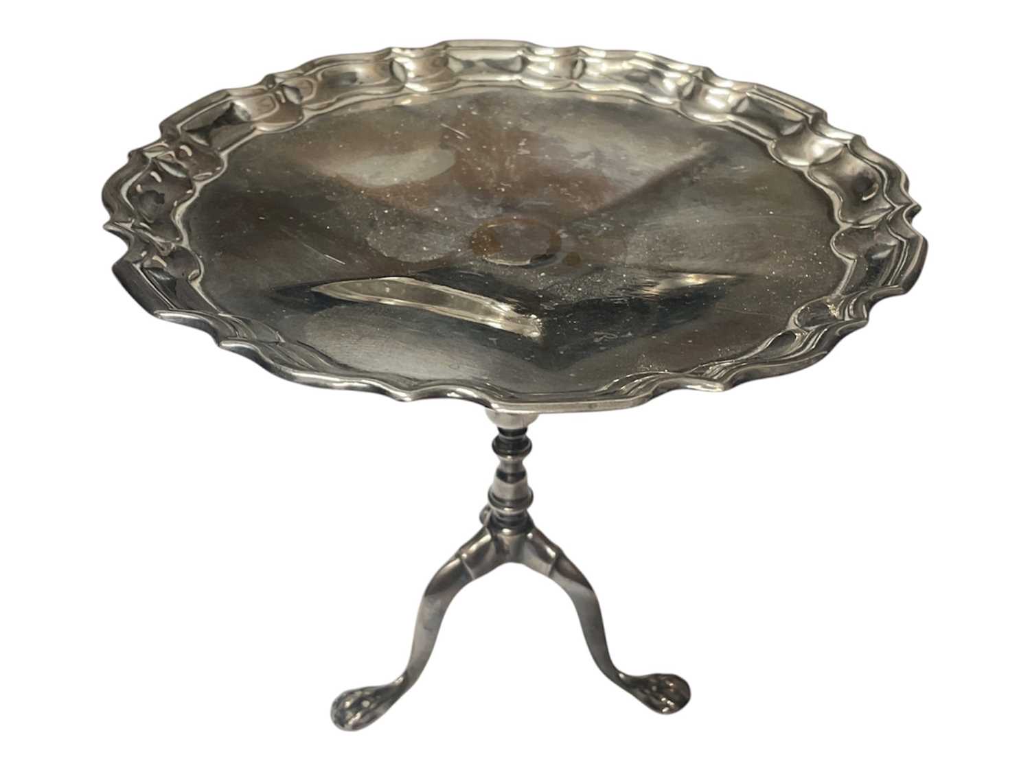 Lot 97 - Edwardian miniature silver tripod wine table with piecrust edge (Sheffield 1908)