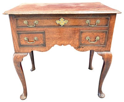 Lot 1400 - Mid 18th century oak and crossbanded three drawer lowboy
