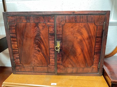 Lot 5398 - Small 18th/19th century mahogany cabinet with cross banding, the interior with one shelf, 73cm wide x 50cm high x 22.5cm deep
