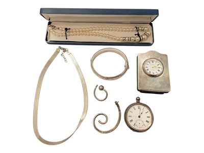 Lot 142 - 1960s silver hinged bangle with engraved decoration, silver necklace, silver swirl pendant, Victorian silver pocket watch, silver mounted Kitney & Co timepiece and a simulated pearl necklace...