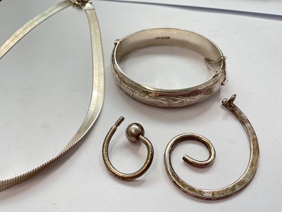 Lot 142 - 1960s silver hinged bangle with engraved decoration, silver necklace, silver swirl pendant, Victorian silver pocket watch, silver mounted Kitney & Co timepiece and a simulated pearl necklace...
