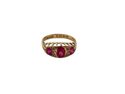 Lot 146 - Antique 18ct gold pink synthetic three stone ring with rose cut diamond accents (Chester 1916)