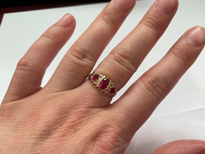 Lot 146 - Antique 18ct gold pink synthetic three stone ring with rose cut diamond accents (Chester 1916)