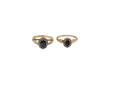 Lot 147 - Two 18ct gold blue sapphire and diamond cluster rings