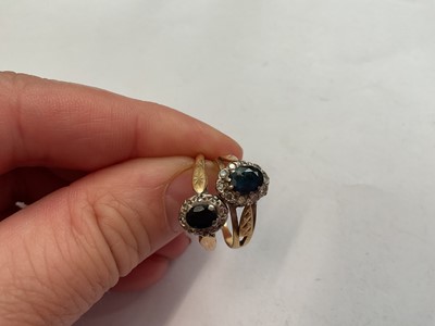 Lot 147 - Two 18ct gold blue sapphire and diamond cluster rings