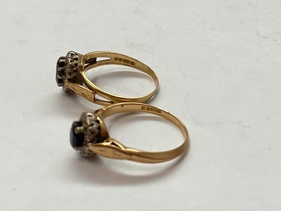 Lot 147 - Two 18ct gold blue sapphire and diamond cluster rings