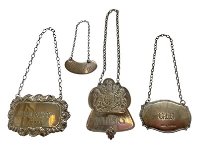Lot 82 - Four silver spirit labels including The Queen's Silver Jubilee limited edition whisky label, numbered 2094 / 2500.