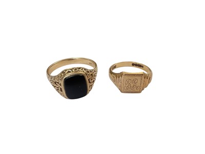 Lot 107 - Yellow metal onyx signet ring stamped 9ct and a 9ct gold signet ring with enrgaved initials RR. (2)