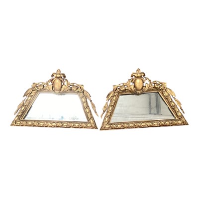Lot 874 - Pair of 19th century trapezoidal wall mirrors in gilded gesso frames