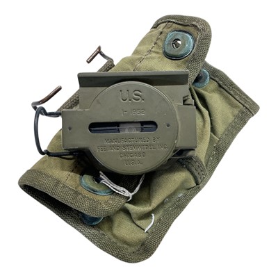 Lot 768 - 1950s American military compass in camouflage painted finish, dated 1952 in canvas case.