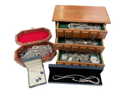Lot 160 - Two wooden jewellery boxes containing a large quantity of silver and white metal chains and pendants