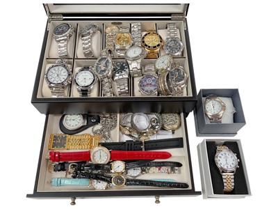 Lot 161 - Group of contemporary stainless steel wristwatches in a display case and other watches