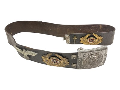 Lot 710 - Second World War Nazi German Hitler Youth belt buckle, stamped to reverse with RZM mark M4 / 22, on a leather belt, mounted with an array of Nazi German badges.