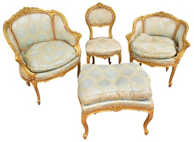 Lot 1353 - 19th century French three-section duchesse brisée, comprising two tub shaped chairs and footstool, the gilded frames with carved rococo scrolls on cabriole legs