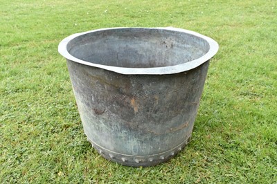 Lot 1342 - Large antique copper vessel / cauldron with riveted construction and verdigris patination, approximately 74cm diameter x 56cm high
