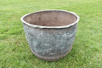 Lot 1343 - Large antique copper vessel / planter with riveted construction and verdigris patination, approximately 74cm diameter x 58cm high