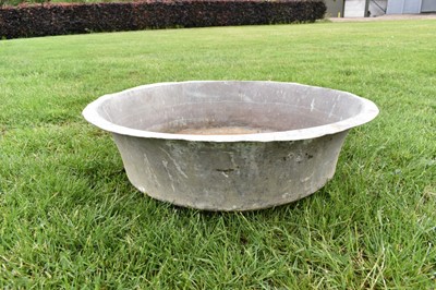 Lot 1345 - Large antique copper vessel / planter of shallow form and verdigris patination, approximately 82cm diameter x 26cm high