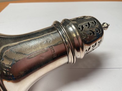 Lot 102 - 1960s silver sugar caster, silver cream jug, Edwardian silver napkin ring, pair of Victorian silver sugar tongs and an Edwardian silver cased pocket watch (5)
