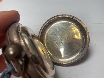 Lot 102 - 1960s silver sugar caster, silver cream jug, Edwardian silver napkin ring, pair of Victorian silver sugar tongs and an Edwardian silver cased pocket watch (5)
