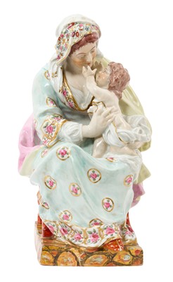 Lot 40 - 19th century pearlware glazed group of the Madonna and child, after a model by Enoch Wood, polychrome painted on a marbled base, 31cm high