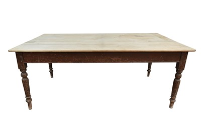 Lot 1352 - Large antique beech and pine kitchen table, the expansive plank top over end drawer on turned supports, 180cm long x 107cm deep x 85cm high