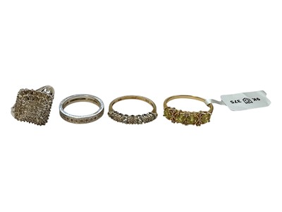 Lot 135 - Diamond cluster ring with a cluster of diamonds totalling 0.50cts in 9ct white gold setting, together with three other 9ct gold and gem-set dress rings (4)