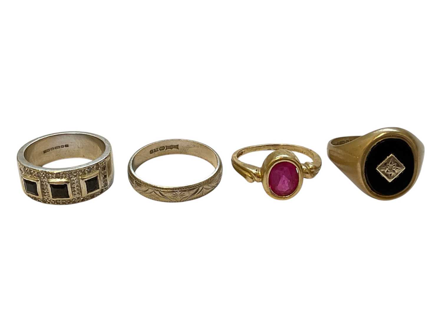 Lot 136 - 9ct white gold sapphire and diamond ring, 9ct white gold wedding ring, 9ct gold single pink stone ring and 9ct gold onyx signet ring (4)