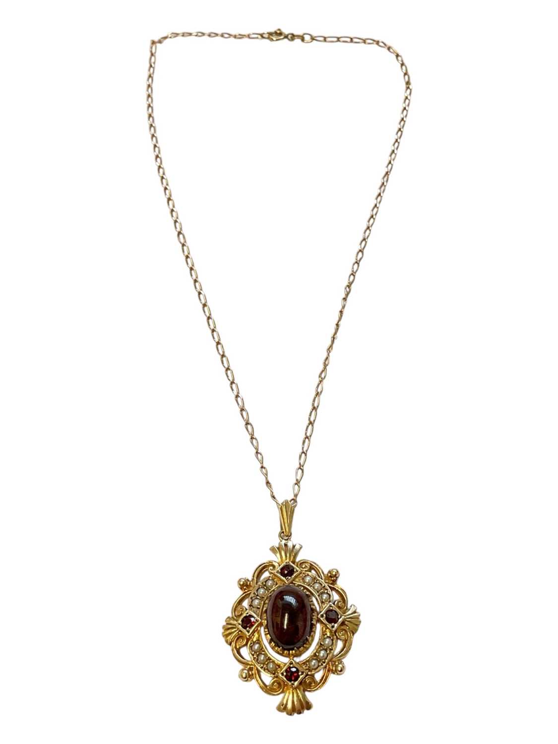 Lot 138 - Victorian style 9ct gold cabochon garnet and seed pearl pendant on a 9ct gold chain