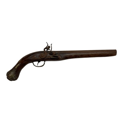 Lot 854 - Indian flintlock pistol, the stock with inlaid wire decoration, 44cm in overall length.