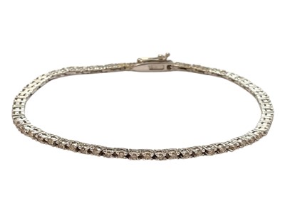 Lot 151 - Diamond tennis bracelet in white gold setting, stamped 18k, estimated total diamond weight approximately 1ct.