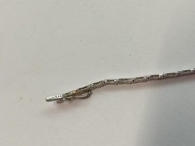 Lot 151 - Diamond tennis bracelet in white gold setting, stamped 18k, estimated total diamond weight approximately 1ct.