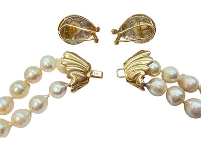 Lot 152 - Cultured pearl two strand necklace with 9ct gold bow shaped clasp and a pair of 14ct gold mounted cultured pearl and diamond earrings