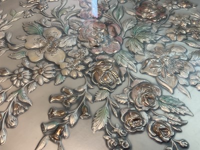 Lot 153 - Italian silver (925) oval plaque with embossed floral decoration in glazed frame / tray