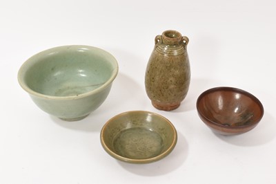 Lot 32 - Small antique Chinese Yaozhou type carved celadon dish, 10.75cm diameter, together with a celadon bowl, vase with lug handles, and a hare's fur bowl (4)
