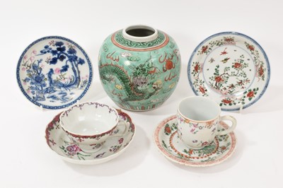 Lot 46 - Two small 18th century Chinese famille verte dishes, 12cm and 13cm diameter, together with a famille rose cup and saucer, another cup, saucer and a later famille verte jar (7)