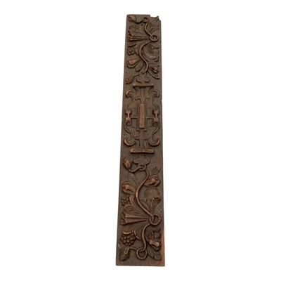 Lot 872 - 17th century carved oak relief panel, with strapwork and entwined vines, 82 x 12.5cm