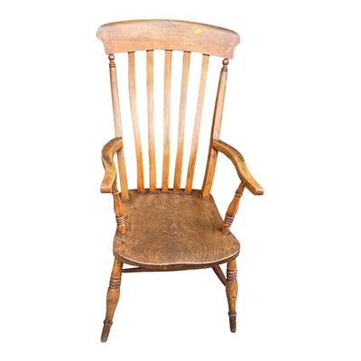 Lot 5393 - Antique beech stick back elbow chair with solid seat
