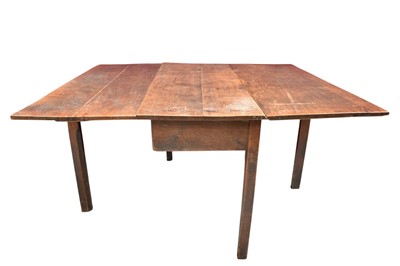 Lot 1312 - 18th century oak drop-leaf dining table on square legs