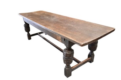 Lot 1310 - 17th century and later oak refectory table on carved bulbous legs joined by supports