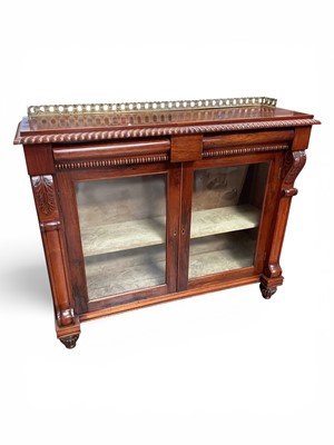 Lot 1458 - Late Regency mahogany two door glazed cabinet