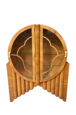 Lot 1475 - Art Deco walnut rocket form display cabinet