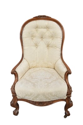 Lot 1454 - Victorian carved walnut and cream upholstered armchair