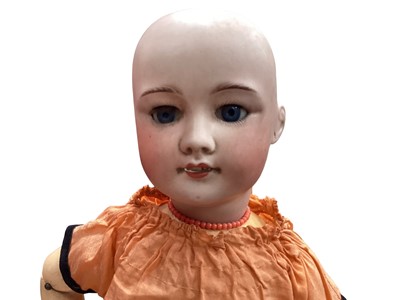Lot 1973 - Antique French doll by SFBJ (Société Française de Fabrication de Bébés et Jouets), bisque porcelain head with sleeping eyes, open mouth, pierced ears, jointed painted wooden composite limbs, imp...