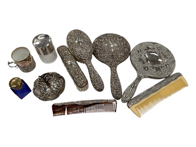 Lot 1044 - Silver mounted dress table items, silver topped glass perfume bottle, blue glass perfume bottle, Royal Crown Derby cup in silver holder, plated mirror and comb